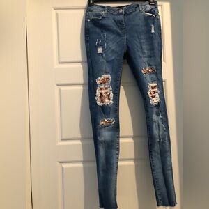 PARISIAN ripped jeans with sequin